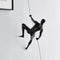 Glossy Black Wall Sculpture Climbing 15" Man